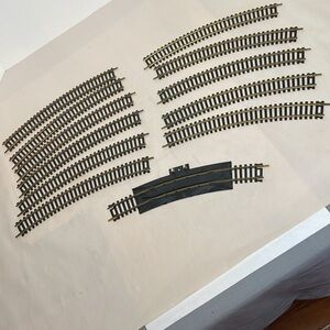 HO Tracks 12 pieces -11 Tyco #15685 and 1 R T 18"Rerailer terminal track 25671